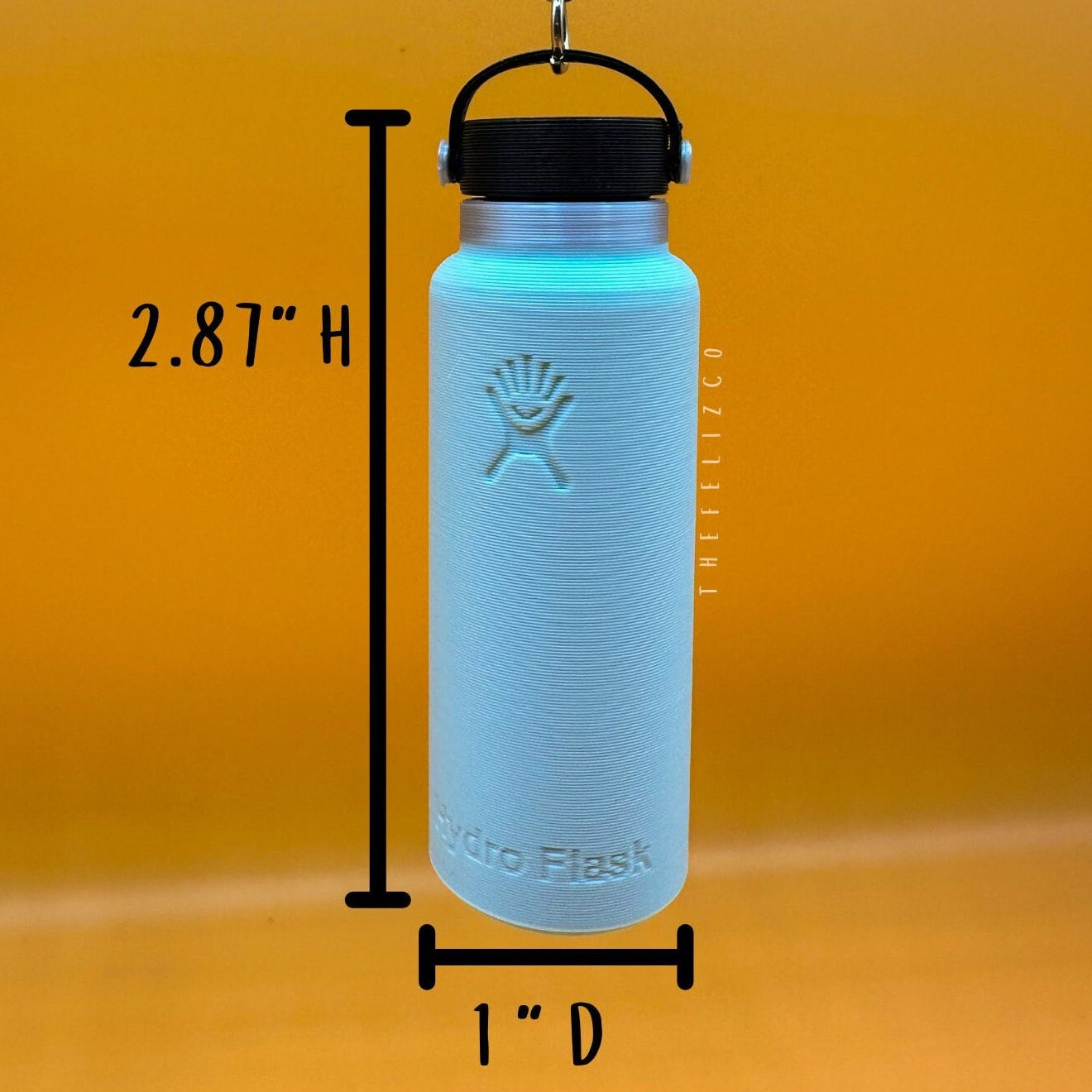 Light blue Hydro Flask water bottle with measurements on an orange background